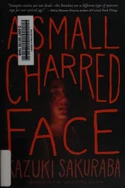 A small charred face